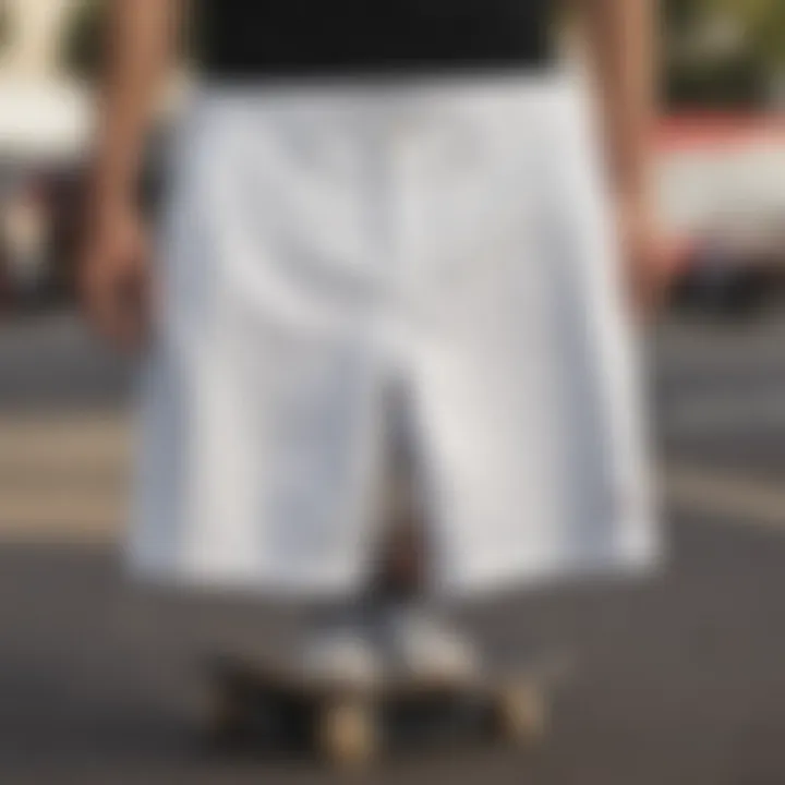 Stylish white hybrid shorts displayed on a skateboard