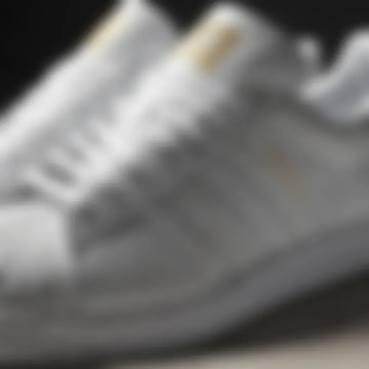 Close-up of Adidas white Superstar shoes showcasing design details