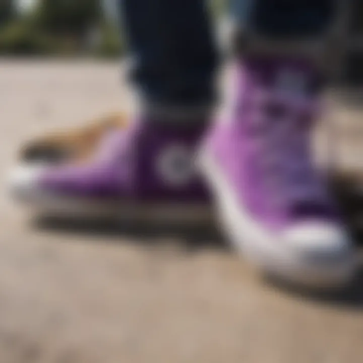 Vibrant purple Converse shoes on a skateboard