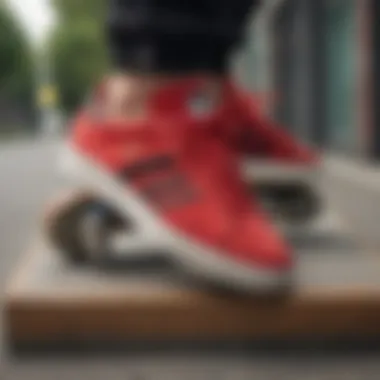 Vibrant red Adidas sneakers on a skateboard