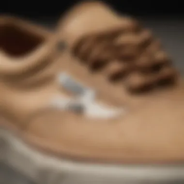 Close-up of tan vans showcasing texture and design