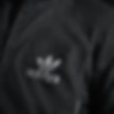 Close-up of the fabric and stitching of the Adidas quarter zip jacket