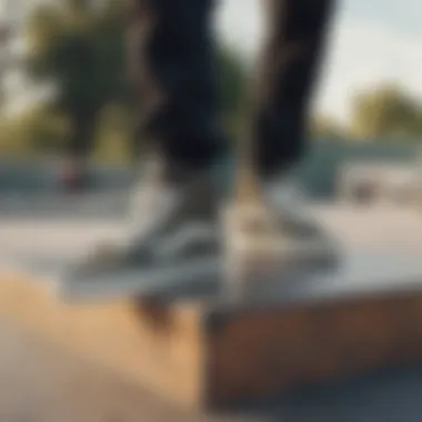 Group of skaters wearing camo Vans shoes at a skatepark