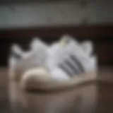 Close-up view of Adidas White Superstar shoes showcasing their iconic design