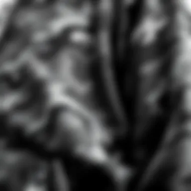 Texture of Gray Camouflage Hoodie Close-up of gray camouflage fabric texture