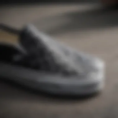 Close-up view of Vans Slip-On Black Checker showcasing the checkerboard pattern and stitching details