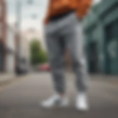 A person showcasing the versatility of Nike Essentials Loose Fit Sweatpants in an urban environment