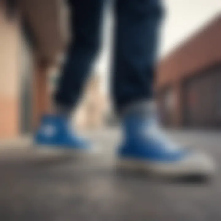 Group of skateboarders showcasing their blue Converse shoes