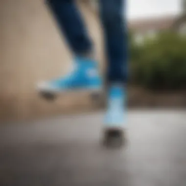 Skater performing tricks while wearing blue Converse shoes