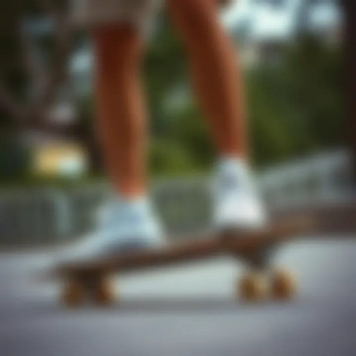 Skater in Action with Floral Converse Skater wearing white Converse with floral designs on a skateboard