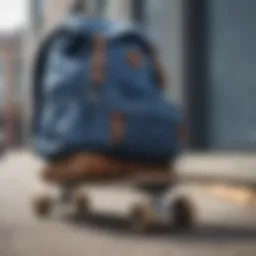 A stylish denim backpack leaning against a skateboard