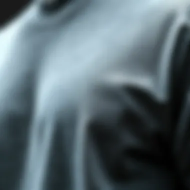 Fabric Texture of the Grey Champion T-Shirt A close-up view of the Grey Champion T-Shirt's fabric texture