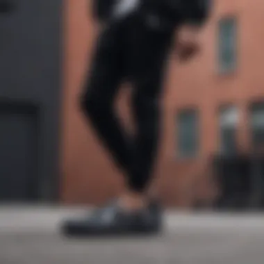 Streetwear Style Featuring All Black Slip-Ons Fashionable streetwear ensemble with all black slip-ons